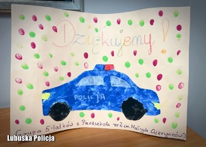 Malunek dzieci przedstawiający radiowóz oraz słowa podziękowania.